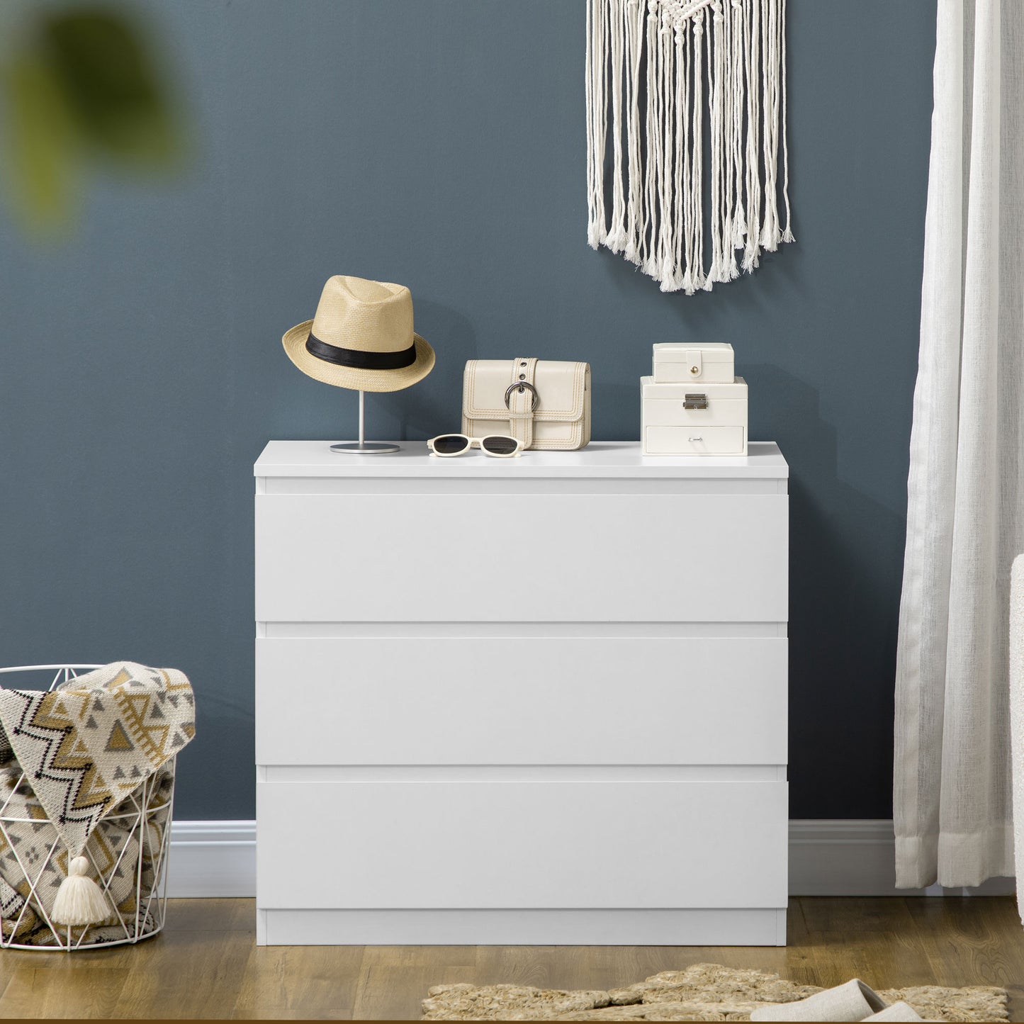 Three drawers offer lots of storage clothing - White